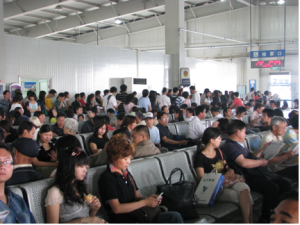 Passengers waiting for their train at Tianjin Station. Image: Lyndsey Biddle