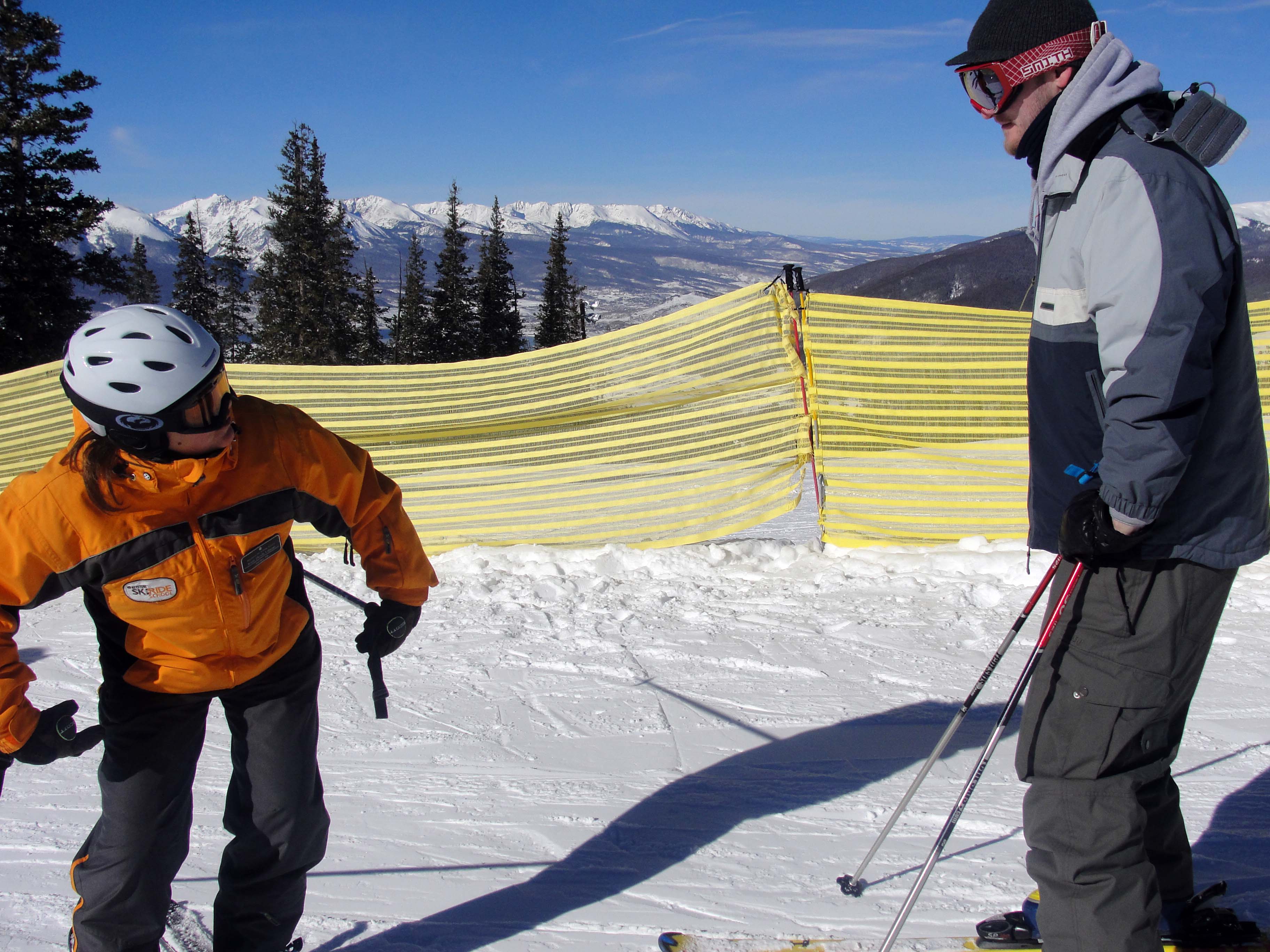 Kim teaching Bryan skiing techniques